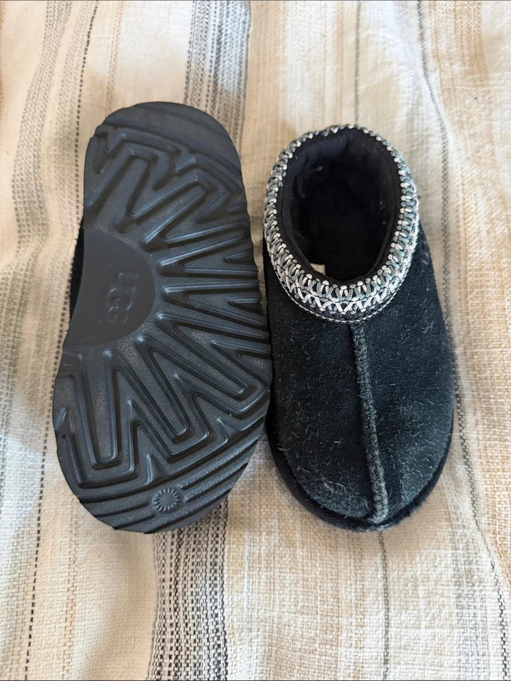 UGGS Kids Black Slip-On Cozy Slippers with Decorative Trim